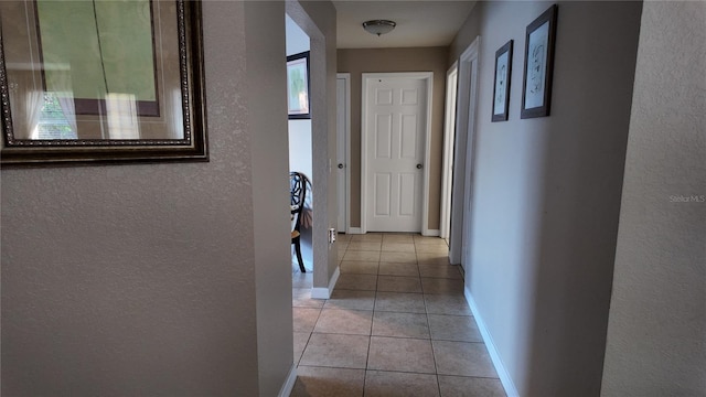 270 Planter Rd, Spring Hill, FL 34606 - hall featuring a textured wall and light tile patterned floors