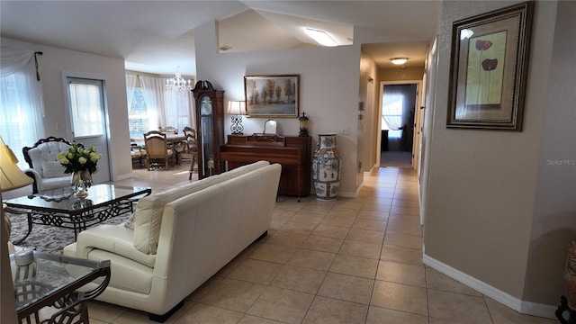 270 Planter Rd, Spring Hill, FL 34606 - living area featuring light tile patterned flooring, a chandelier, and lofted ceiling