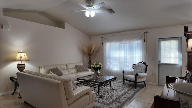 270 Planter Rd, Spring Hill, FL 34606 - living area featuring a ceiling fan, vaulted ceiling, light tile patterned floors, and plenty of natural light
