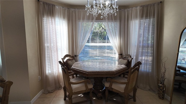 270 Planter Rd, Spring Hill, FL 34606 - dining room with a chandelier and light tile patterned flooring