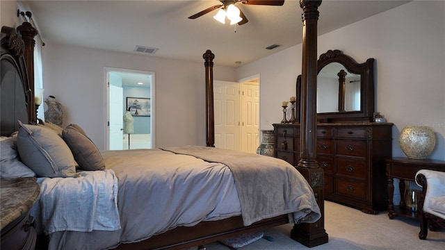 270 Planter Rd, Spring Hill, FL 34606 - bedroom with light colored carpet, a ceiling fan, and ensuite bath