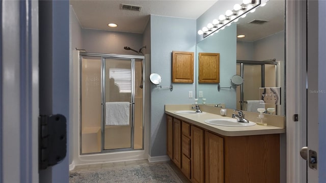 270 Planter Rd, Spring Hill, FL 34606 - bathroom with a shower with door and double vanity