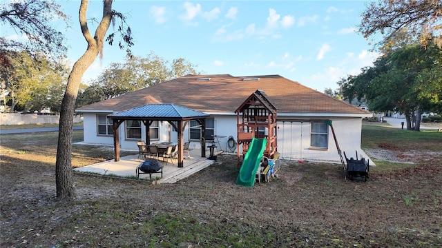 270 Planter Rd, Spring Hill, FL 34606 - rear view of property featuring a gazebo and a patio