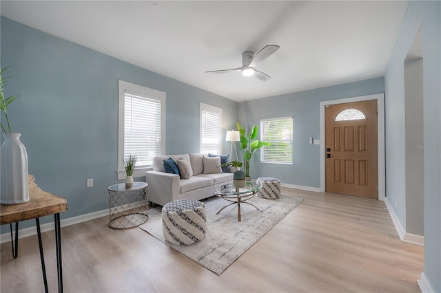 811 W Peninsular St, Tampa, FL 33603 - living area with light wood finished floors and ceiling fan