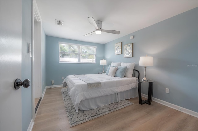 811 W Peninsular St, Tampa, FL 33603 - bedroom with light wood-type flooring and a ceiling fan