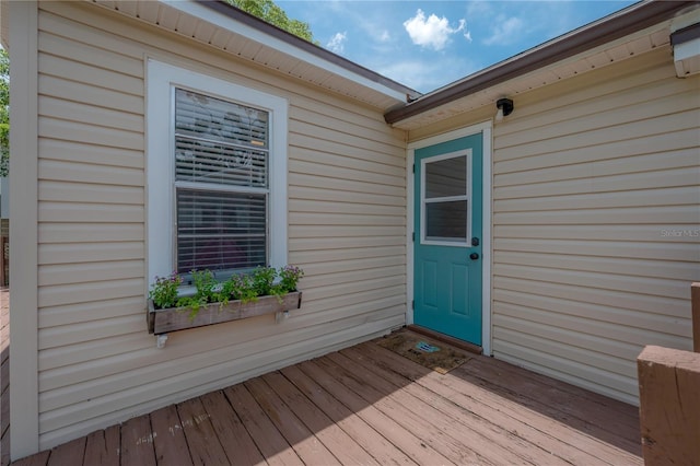 811 W Peninsular St, Tampa, FL 33603 - entrance to property with a wooden deck
