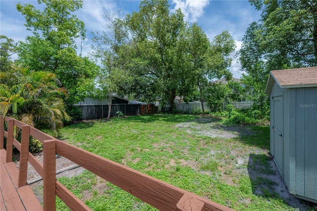 811 W Peninsular St, Tampa, FL 33603 - fenced backyard with a storage unit