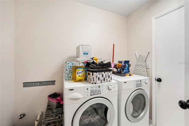 1763 Pebble Hill Ct, Palm Harbor, FL 34683 - laundry area with separate washer and dryer and a textured ceiling