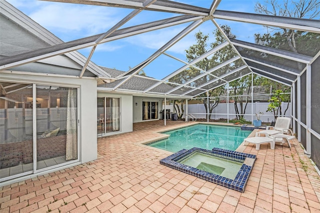 1763 Pebble Hill Ct, Palm Harbor, FL 34683 - view of swimming pool with a patio area, a pool with connected hot tub, a fenced backyard, and glass enclosure