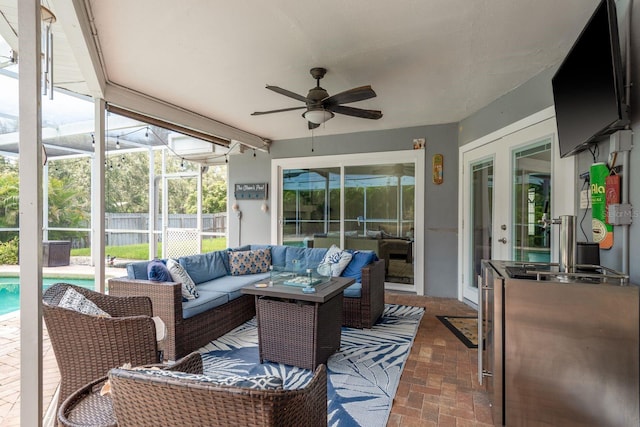 2800 Resnik Cir W, Palm Harbor, FL 34683 - sunroom / solarium featuring outdoor lounge area and a ceiling fan