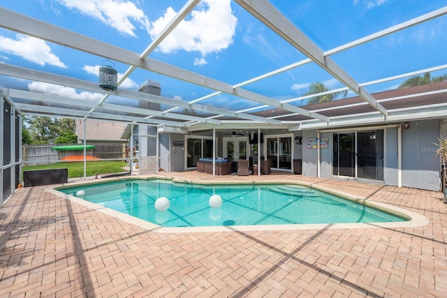 2800 Resnik Cir W, Palm Harbor, FL 34683 - view of pool with a patio area, a lanai, a ceiling fan, and outdoor lounge area