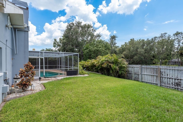 2800 Resnik Cir W, Palm Harbor, FL 34683 - fenced backyard with glass enclosure
