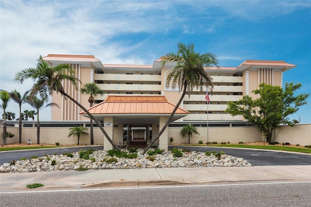 1150 Tarpon Center Dr Unit 1D, Venice, FL 34285 - view of property with asphalt driveway