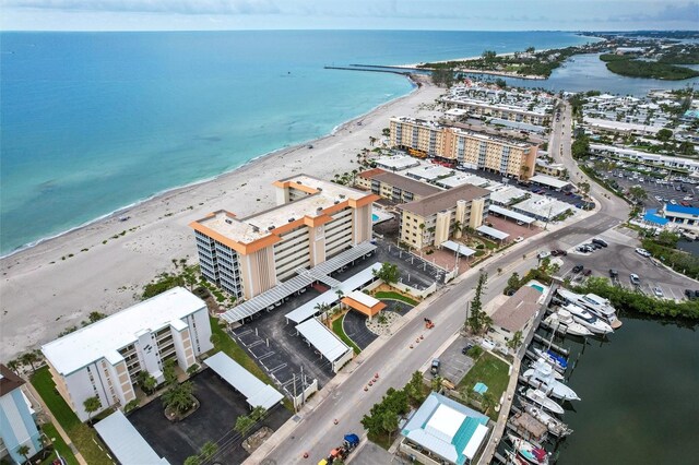 1150 Tarpon Center Dr Unit 1D, Venice, FL 34285 - aerial view of waterfront with a beach