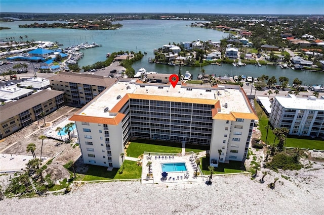 1150 Tarpon Center Dr Unit 1D, Venice, FL 34285 - bird's eye view of a pool area and a large body of water