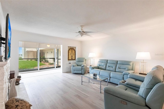 1150 Tarpon Center Dr Unit 1D, Venice, FL 34285 - living room with wood finished floors and a ceiling fan