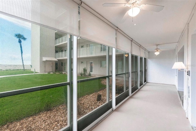 1150 Tarpon Center Dr Unit 1D, Venice, FL 34285 - unfurnished sunroom featuring a ceiling fan