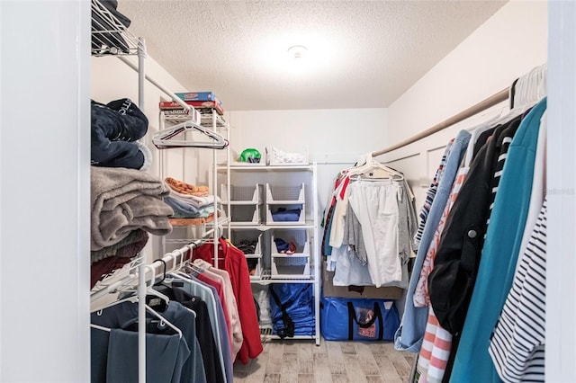 1150 Tarpon Center Dr Unit 1D, Venice, FL 34285 - spacious closet featuring wood finished floors