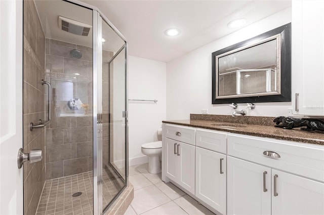 1150 Tarpon Center Dr Unit 1D, Venice, FL 34285 - bathroom with vanity, a shower stall, tile patterned flooring, and recessed lighting