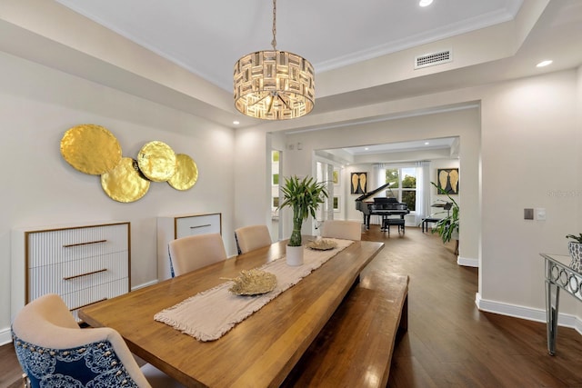 2711 W Trilby Ave, Tampa, FL 33611 - dining area with recessed lighting, dark wood-style flooring, a chandelier, and crown molding
