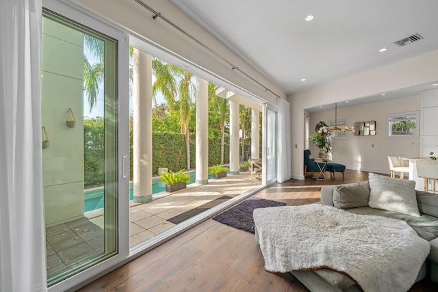 2711 W Trilby Ave, Tampa, FL 33611 - living area featuring plenty of natural light, wood finished floors, and recessed lighting
