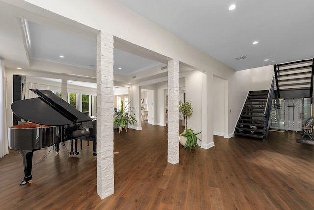2711 W Trilby Ave, Tampa, FL 33611 - interior space with stairs, decorative columns, recessed lighting, wood finished floors, and ornamental molding