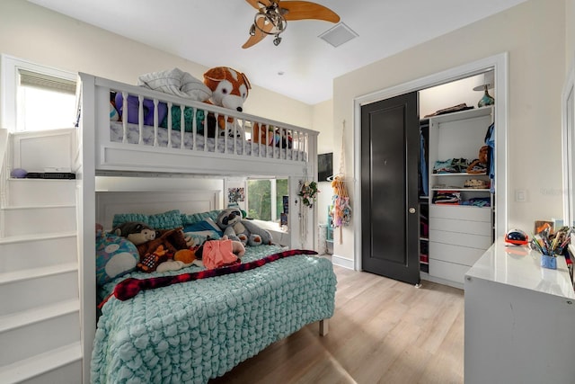 2711 W Trilby Ave, Tampa, FL 33611 - bedroom featuring light wood-type flooring, a ceiling fan, and a closet