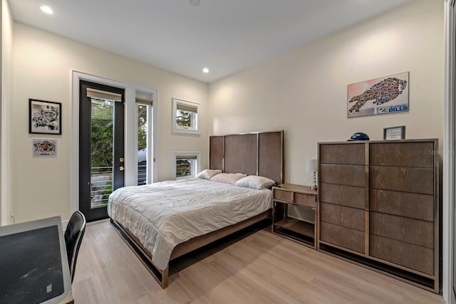 2711 W Trilby Ave, Tampa, FL 33611 - bedroom with access to exterior, light wood-type flooring, and recessed lighting