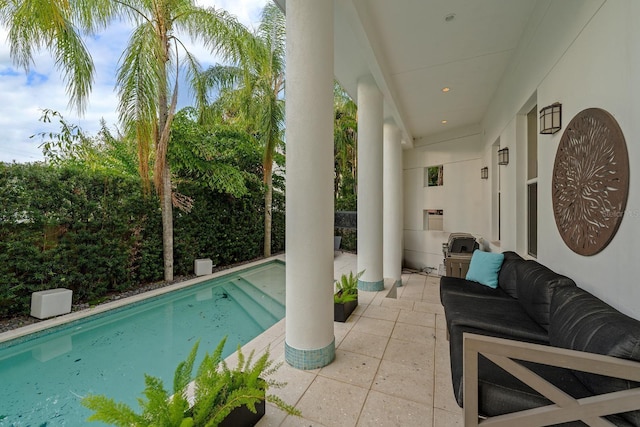 2711 W Trilby Ave, Tampa, FL 33611 - outdoor pool featuring a patio area and an outdoor living space