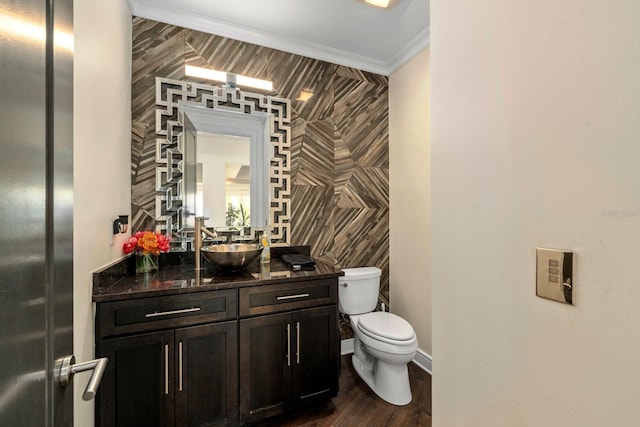 2711 W Trilby Ave, Tampa, FL 33611 - bathroom with vanity, ornamental molding, and wood finished floors