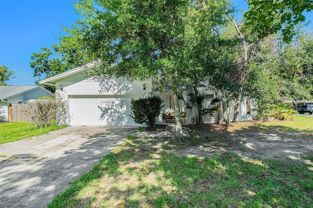 801 Lamont Pl, Temple Terrace, FL 33617 - view of front of home featuring driveway and a garage