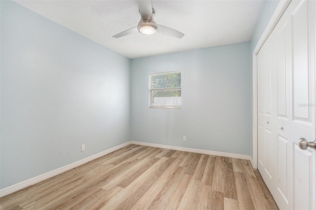 801 Lamont Pl, Temple Terrace, FL 33617 - unfurnished bedroom with a closet, light wood-style flooring, and ceiling fan