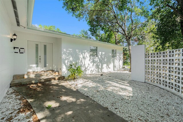 801 Lamont Pl, Temple Terrace, FL 33617 - view of yard featuring french doors