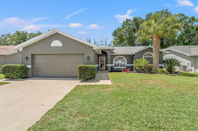10032 Basin St, New Port Richey, FL 34655 - ranch-style house with an attached garage, stucco siding, concrete driveway, and a front lawn