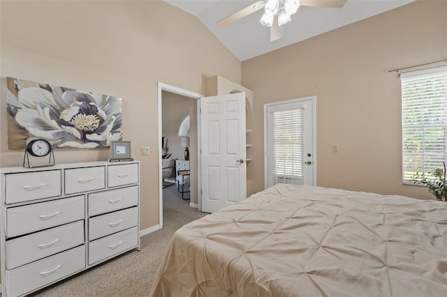 10032 Basin St, New Port Richey, FL 34655 - bedroom with vaulted ceiling, light carpet, multiple windows, and ceiling fan