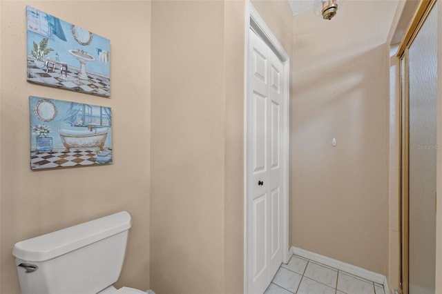 10032 Basin St, New Port Richey, FL 34655 - bathroom featuring a closet and a shower with door