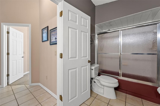10032 Basin St, New Port Richey, FL 34655 - full bath featuring tile patterned floors and shower / bath combination with glass door