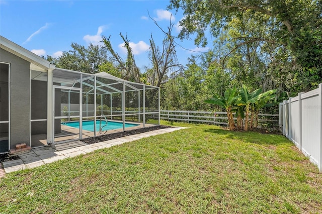 10032 Basin St, New Port Richey, FL 34655 - fenced backyard featuring a patio and a lanai