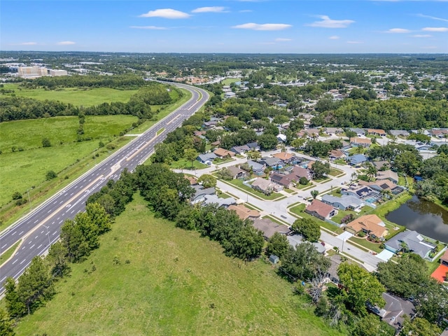 10032 Basin St, New Port Richey, FL 34655 - aerial view of property's location featuring a major roadway and nearby suburban area