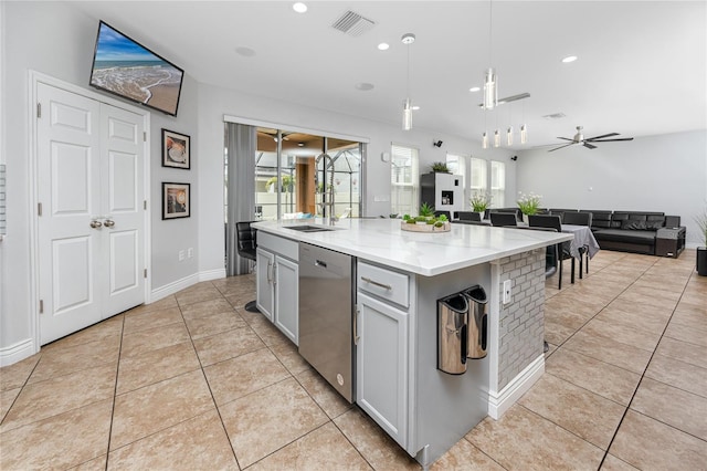 1601 Fox Grape Loop, Lutz, FL 33558 - kitchen featuring stainless steel dishwasher, plenty of natural light, open floor plan, light tile patterned floors, and recessed lighting