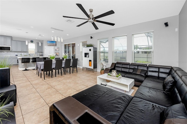 1601 Fox Grape Loop, Lutz, FL 33558 - living room featuring light tile patterned flooring, ceiling fan, and recessed lighting