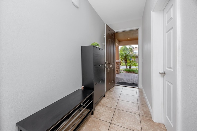 1601 Fox Grape Loop, Lutz, FL 33558 - doorway to outside with light tile patterned floors and baseboards