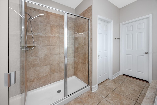 1601 Fox Grape Loop, Lutz, FL 33558 - bathroom featuring a shower stall and tile patterned flooring