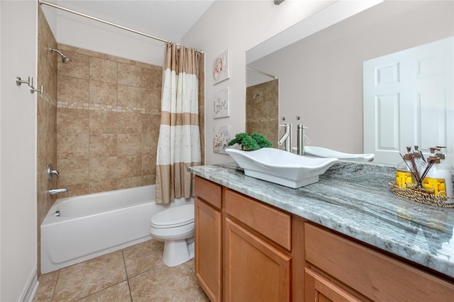 1601 Fox Grape Loop, Lutz, FL 33558 - full bathroom featuring vanity, shower / bath combo with shower curtain, and tile patterned flooring