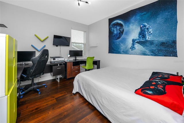 1601 Fox Grape Loop, Lutz, FL 33558 - bedroom with dark wood-style flooring and a desk