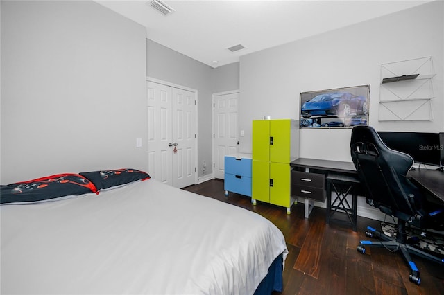 1601 Fox Grape Loop, Lutz, FL 33558 - bedroom with hardwood / wood-style flooring, a desk, and a closet