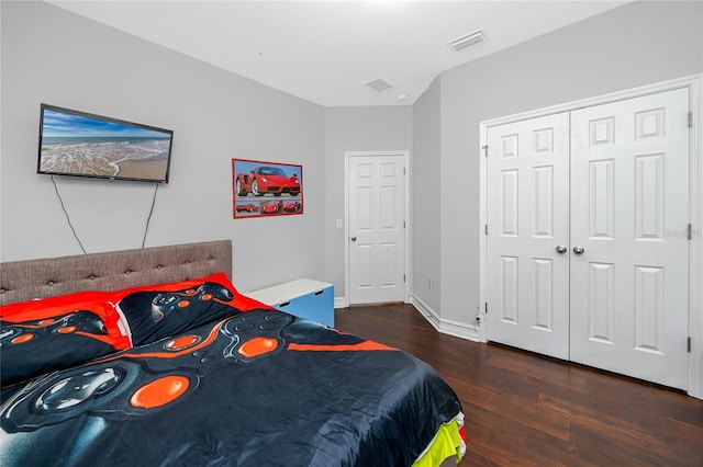 1601 Fox Grape Loop, Lutz, FL 33558 - bedroom featuring wood finished floors and a closet