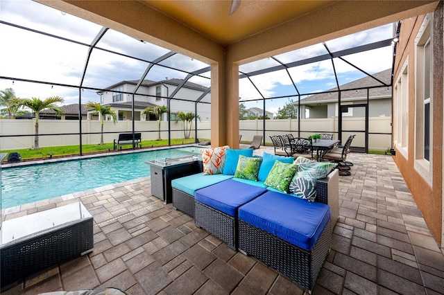 1601 Fox Grape Loop, Lutz, FL 33558 - view of swimming pool featuring a patio area, outdoor dining space, glass enclosure, and outdoor lounge area