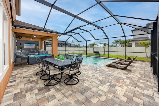 1601 Fox Grape Loop, Lutz, FL 33558 - view of pool featuring a patio area, a fenced backyard, glass enclosure, and outdoor dining space