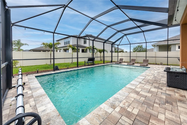 1601 Fox Grape Loop, Lutz, FL 33558 - view of pool featuring a patio area, a fenced backyard, and a lanai